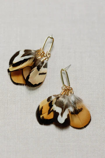 THE QUAIL FEATHER
